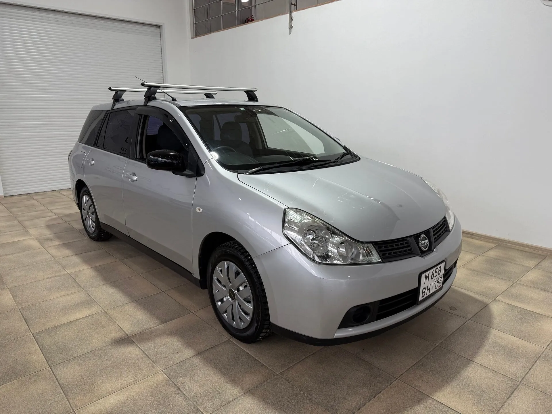 Nissan Wingroad — фото 2 из 35