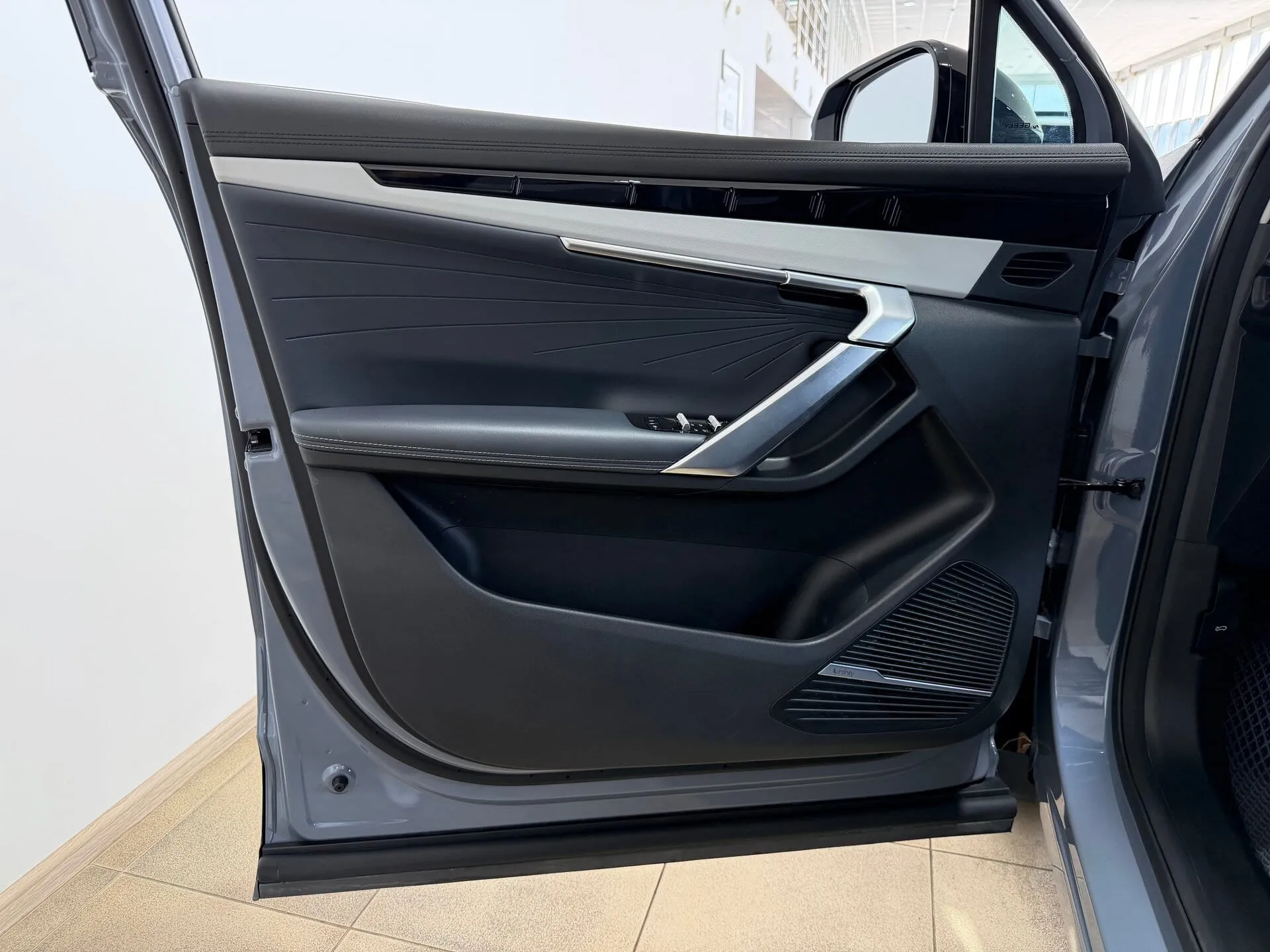 Geely Atlas — фото 37 из 44