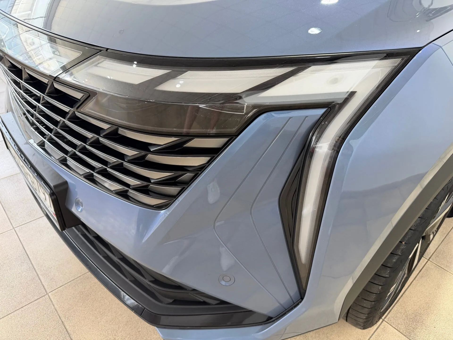 Geely Atlas — фото 19 из 44
