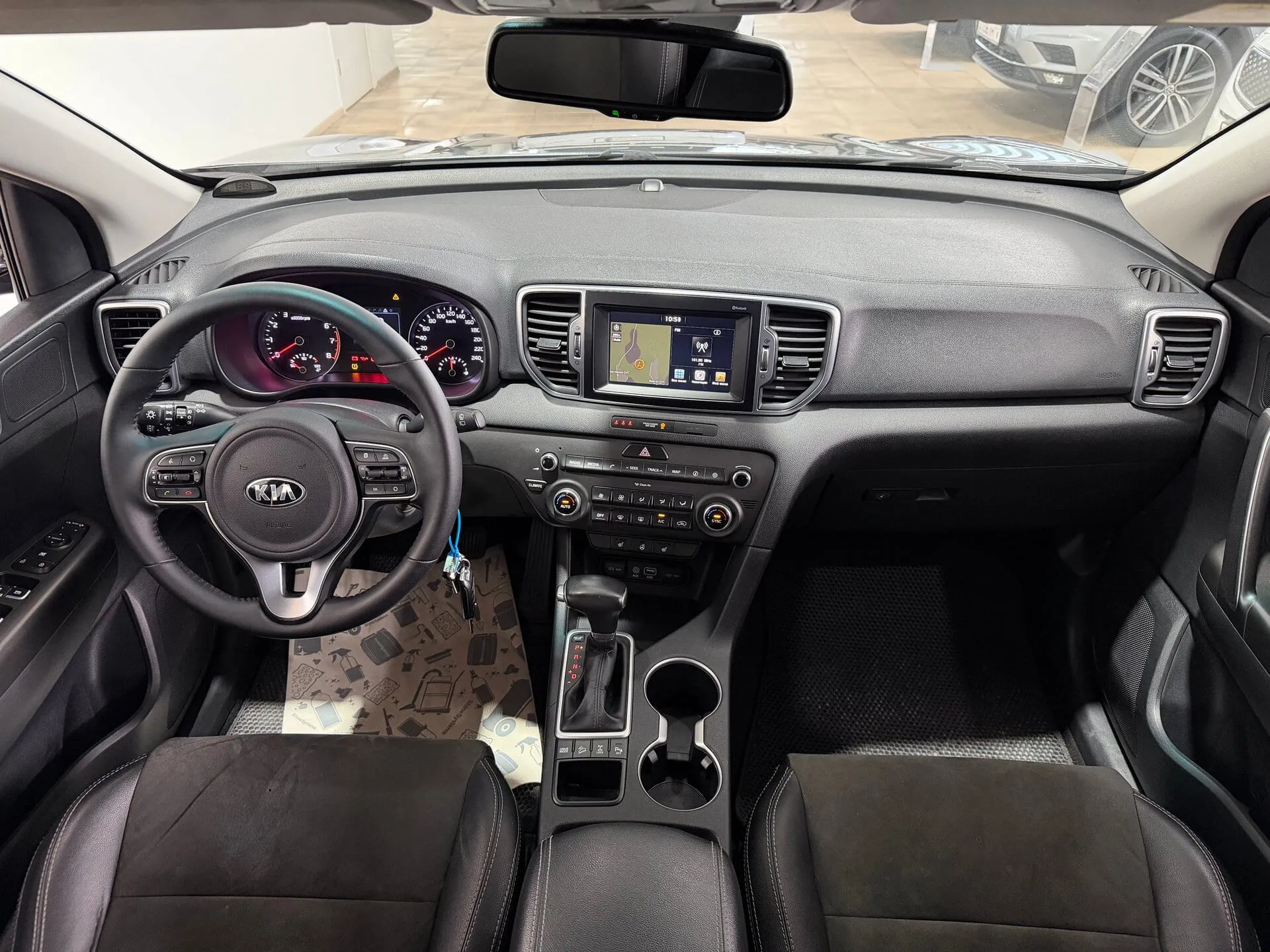 Kia Sportage — фото 9 из 36