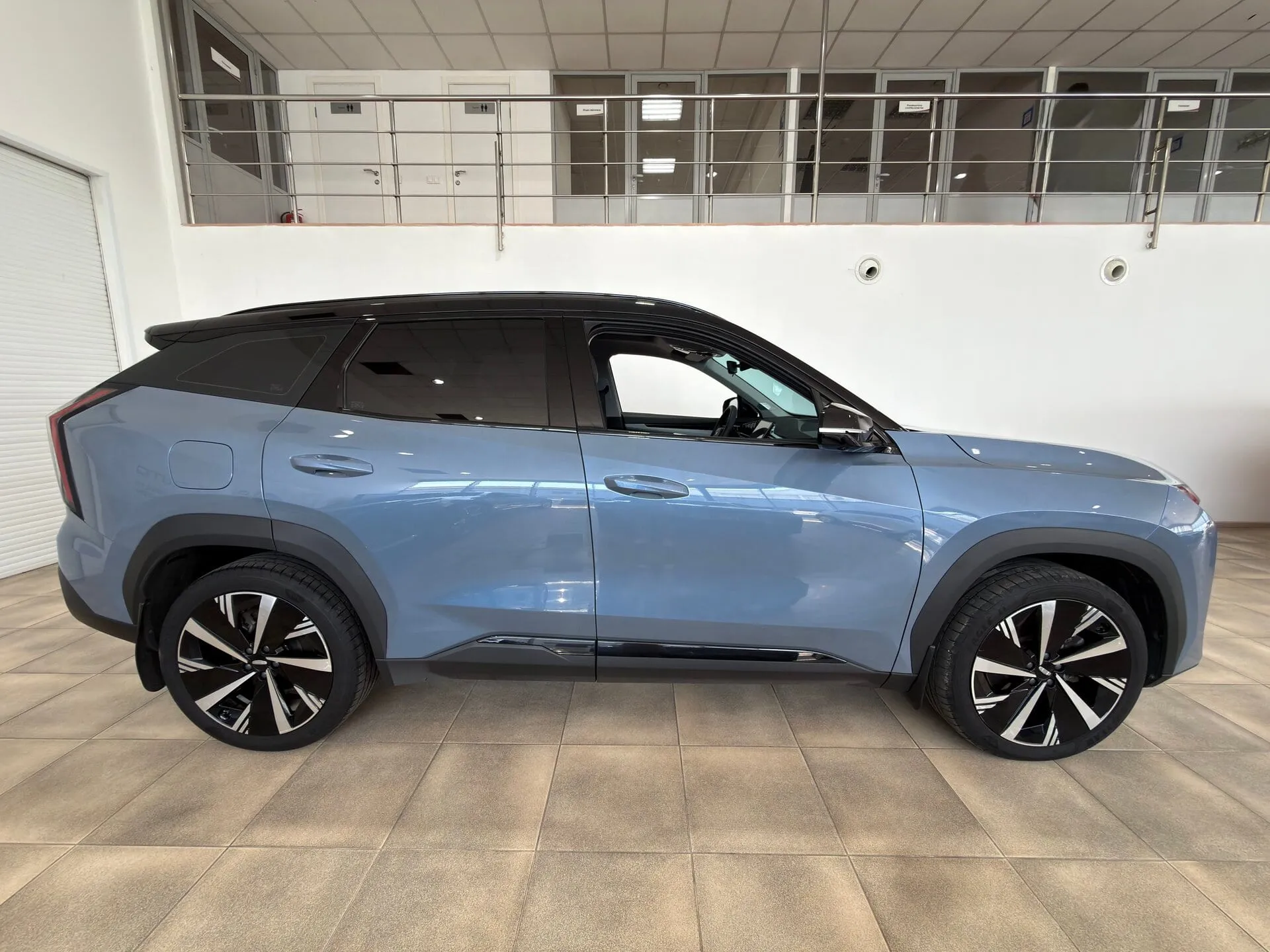 Geely Atlas — фото 7 из 44