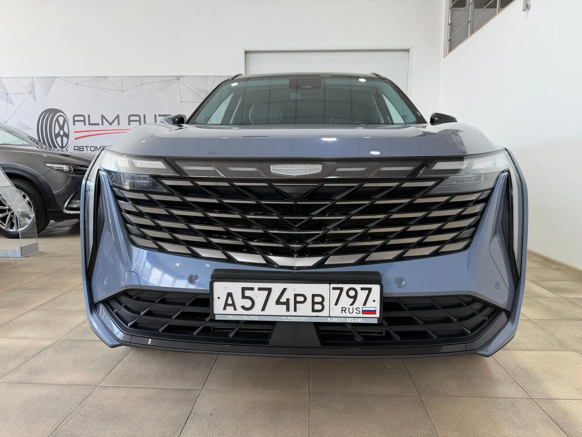Geely Atlas — фото 17 из 44