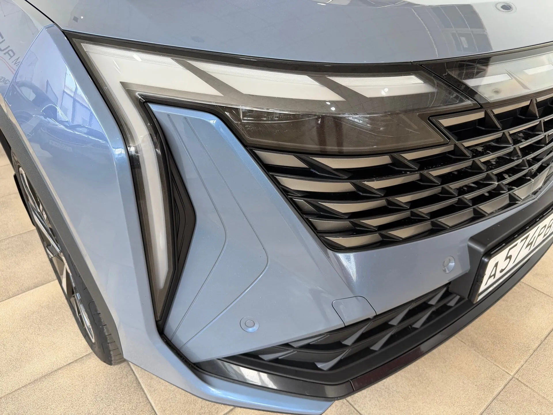 Geely Atlas — фото 18 из 44